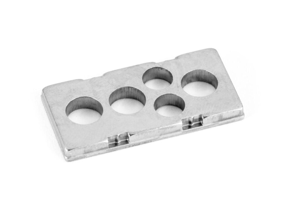 precision metal parts through progressive stamping